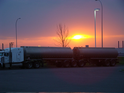sunset over a tanker truck in Acheson Alberta