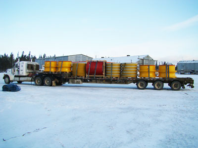 Load of steel rims for big ore trucks in Fort McMurray Alberta